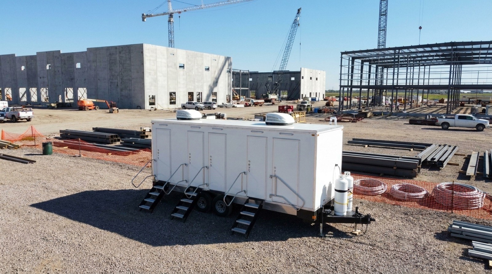 Laundry unit beside a materials laydown yard